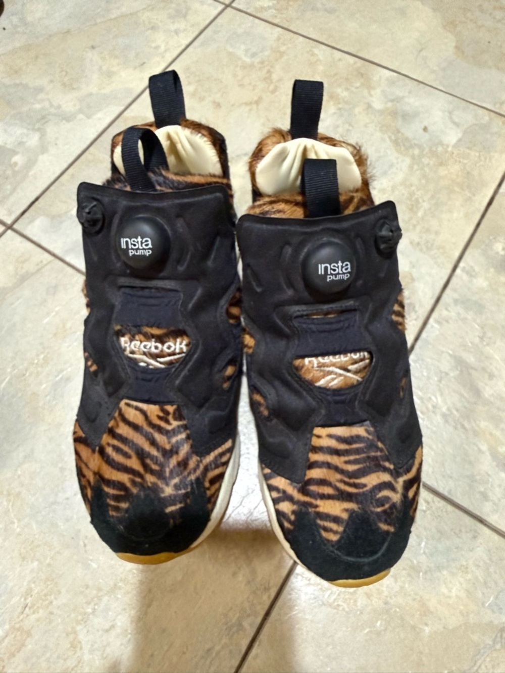 Reebok Insta Pump Slip-On Sneakers in Black and Brown Tiger Print